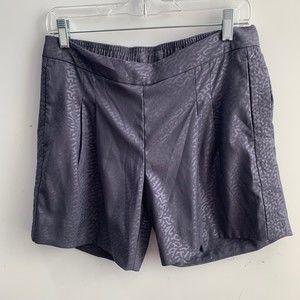 Nike womans pleaded leopard print Shorts Size small